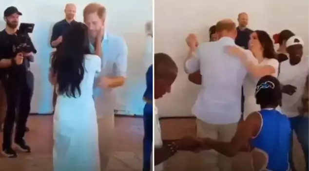 Meghan Markle and Prince Harry passionately kissed while salsa dancing in Colombia.