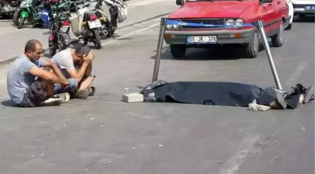 A woman died in a motorcycle accident, and her loved one couldn't leave the body.