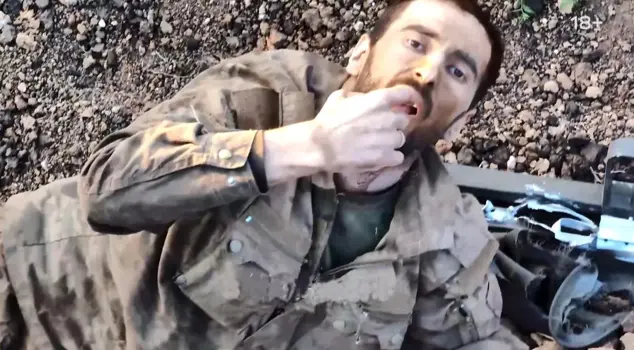 The Russian soldier who thinks he will be killed receives a helping hand from a Ukrainian drone.