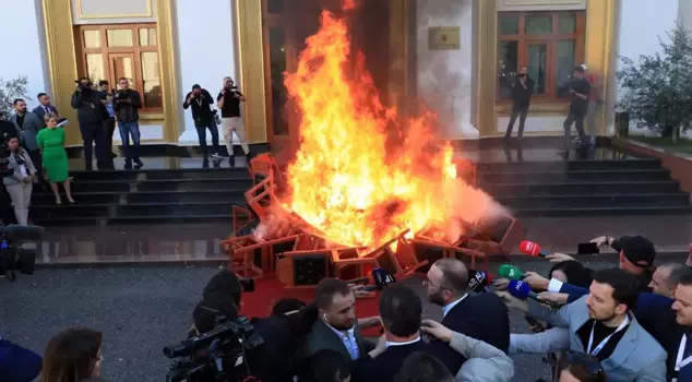 It turns out there are worse than ours! In Albania, unruly MPs set fire to parliamentary seats.