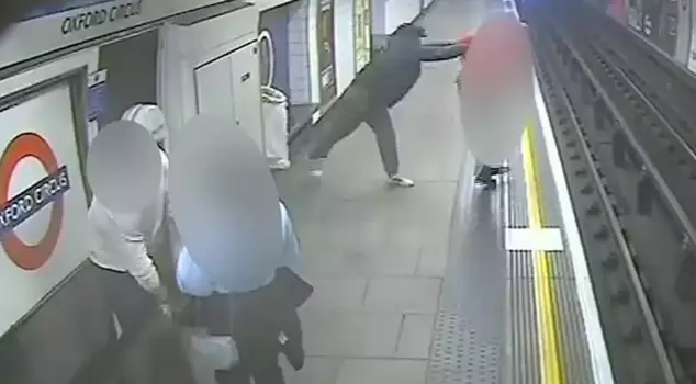 A homeless man who pushed a 60-year-old passenger onto the subway tracks in London has been sentenced to life in prison.