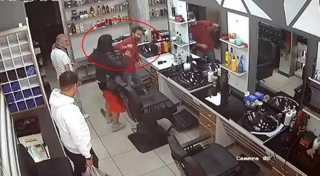 A woman obsessed with her ex-husband stormed into his workplace and attacked.