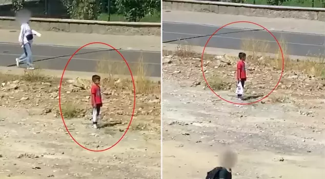 The little boy suddenly stopped while walking down the road! The reason made him proud.