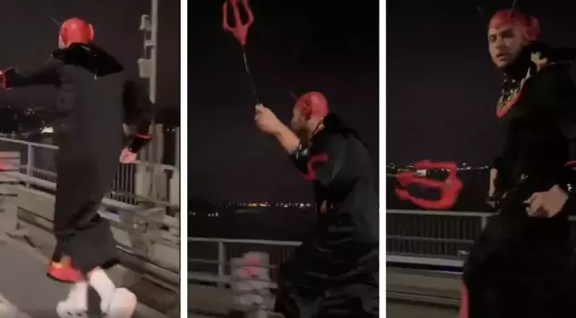 The person running in a devil costume on the bridge was caught.