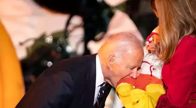 U.S. President Joe Biden bit three babies at the White House Halloween party.