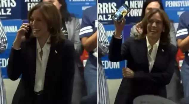 Harris, who claimed to be speaking with a voter on the phone, was caught off guard by the cameras.