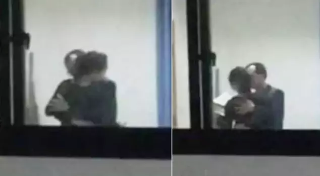 The teacher who was filmed forcibly kissing a female student in the classroom has been fired.