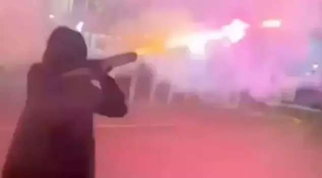 A man dressed as Darth Vader, using a rocket launcher to shoot fireworks at people, caused a panic.