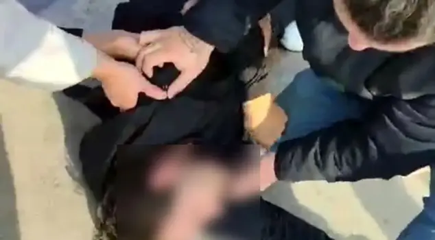A person suddenly collapsed on the ground at a gas station and lost their life.