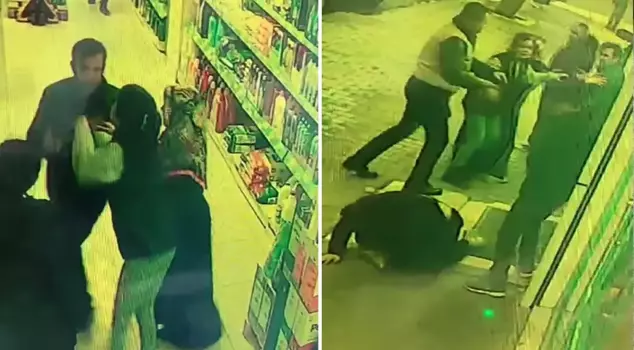 In Esenyurt, a customer shot a female supermarket employee, causing her to fall to the ground.