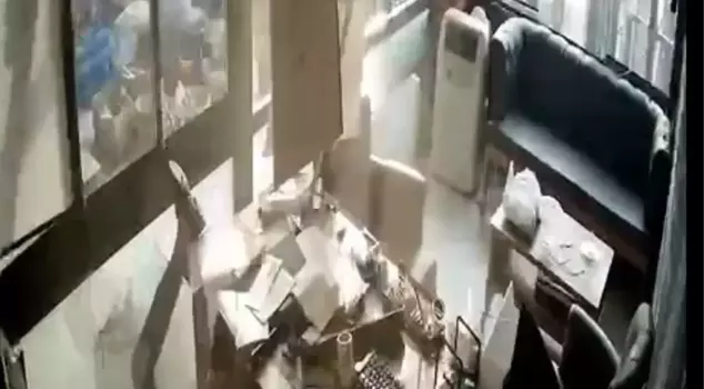 The ceiling he climbed to feed the pigeons collapsed: Those moments are captured on camera.