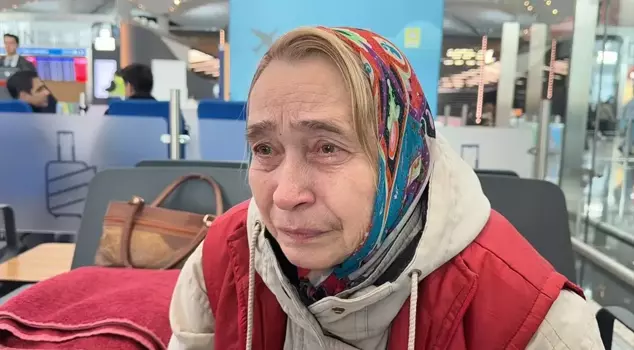 An elderly woman who has been stranded at Istanbul Airport for weeks is waiting for help.