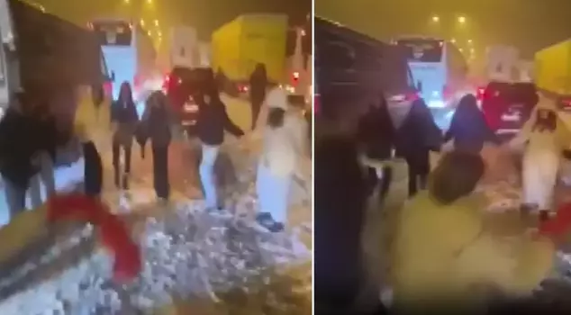 Passengers stranded on the road due to snow danced the halay to keep warm.