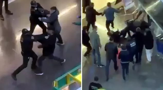 He hit the security guard on the head with a chair in the shopping mall.
