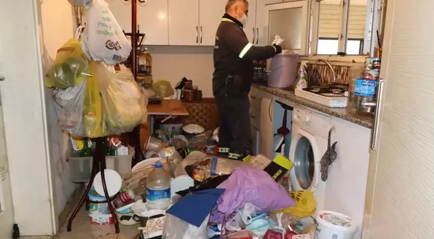 The house that was cleaned up following a smell complaint yielded 4 truckloads of garbage.