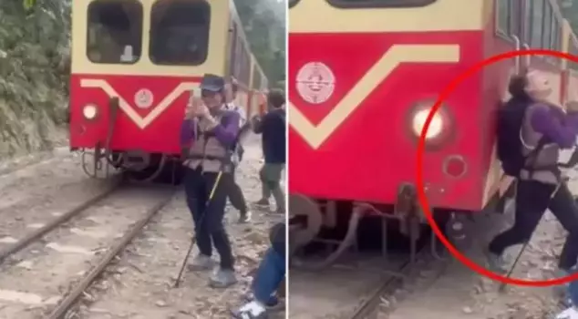 A train hit a tourist who was trying to take a selfie on the tracks.