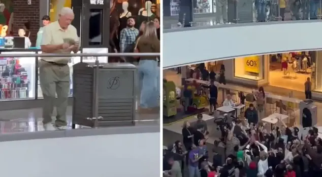 The elderly man distributing money in the shopping mall caused a stampede.