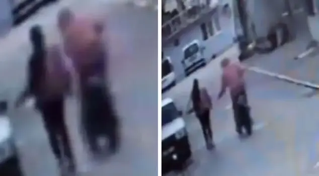 While walking on the road, she was harassed by an attacker on a bicycle.