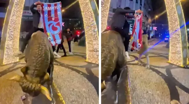 The Trabzonspor fan opened a scarf and shouted at the Bull Statue in Kadıköy.