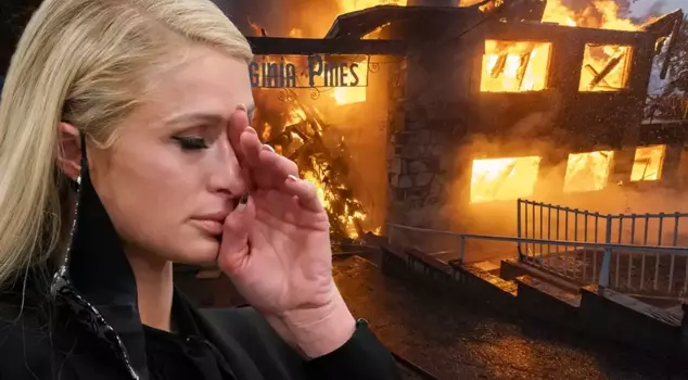 Paris Hilton watched live as flames engulfed her home.