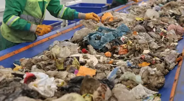 A baby corpse was found on the waste sorting conveyor.