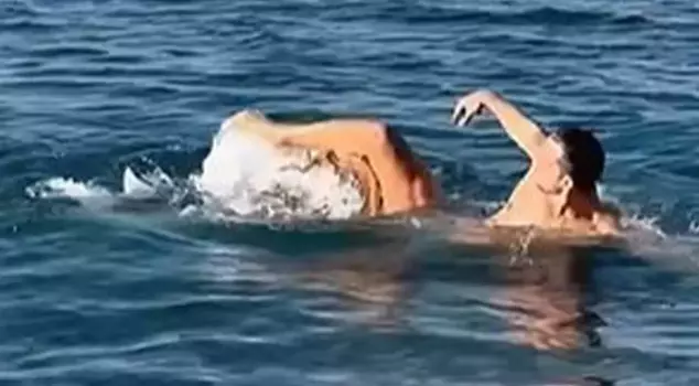 The famous model was attacked by an octopus while swimming in the sea.