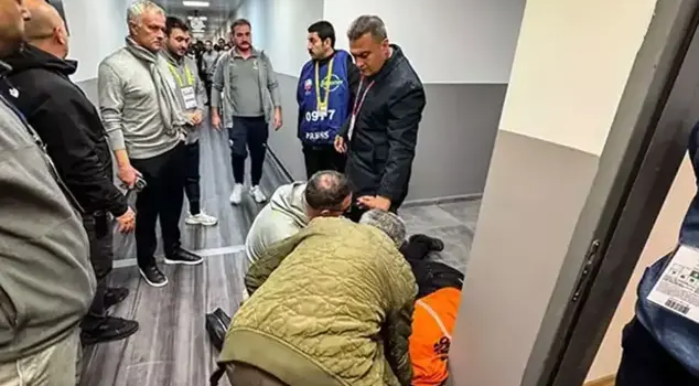 Scary moments after the press conference: Mourinho waited with his head down.