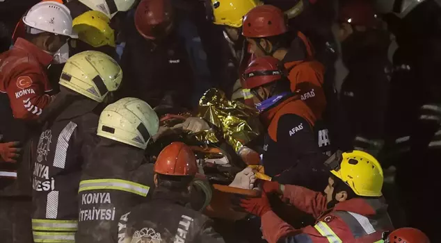 Two people were rescued alive from the rubble of a three-story building that collapsed in Konya.