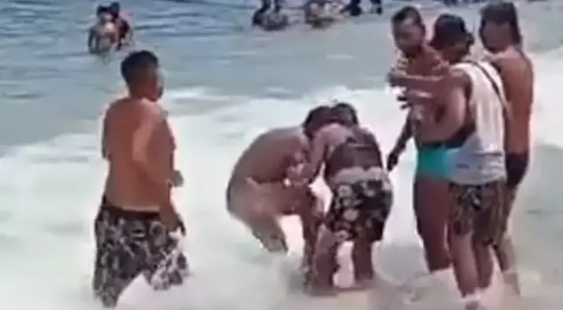 The man caught satisfying himself among the waves was brutally beaten.