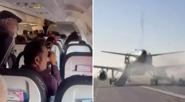 Passenger plane caught fire during takeoff: Passengers evacuated in panic.