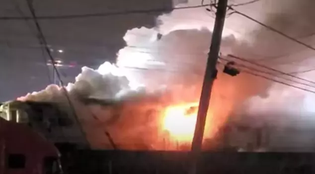 A train carrying 350 passengers was engulfed in flames, and the passengers were evacuated within 15 minutes.