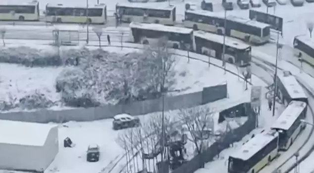 Dozens of IETT buses were stranded on the snow-covered road.