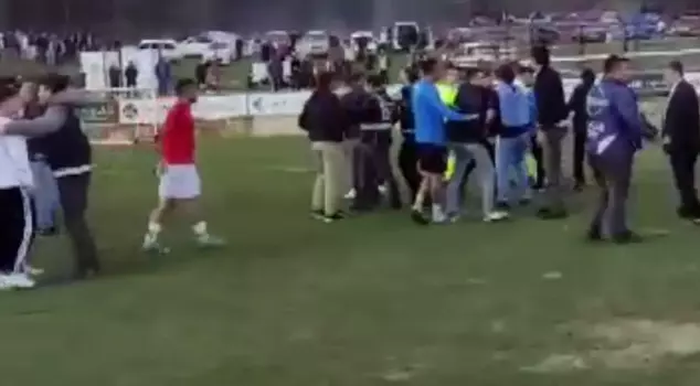 The managers jumped onto the field! They beat the referees with kicks and punches.