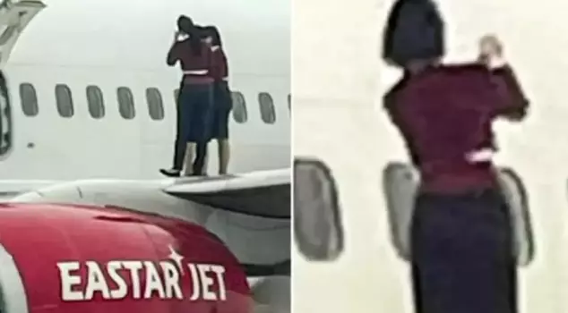 The flight attendants opened the emergency exit door and took a selfie on the wing of the plane.