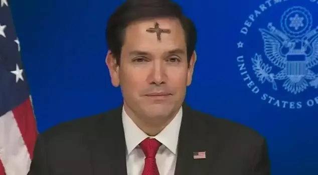 The U.S. Secretary of State appeared on television with a cross mark on his forehead.