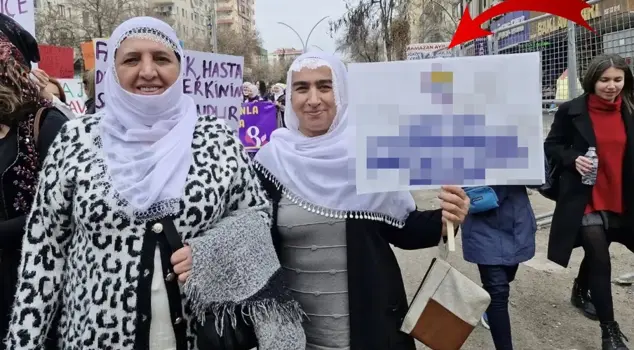 Kurdish activist Zeynep Alkış erupted in anger over the scandalous banner.