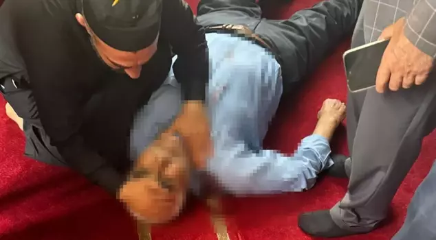 He was stabbed while praying in the mosque.