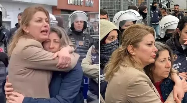 The village headman, who was wanted to be detained, was tightly embraced: 