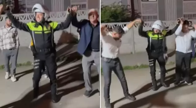 في دوزجة، انضم شرطي المرور إلى الدبكة بعد فتح الطريق الذي أغلق بسبب حفل الزفاف.