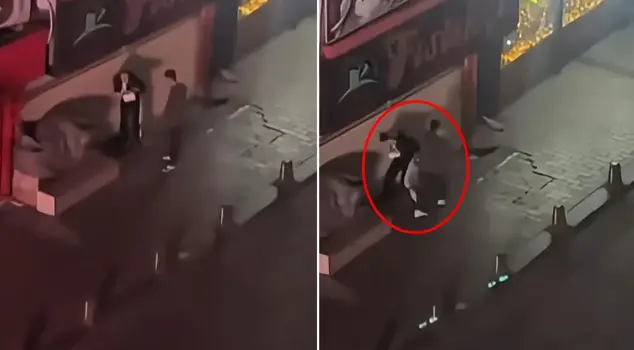 He assaulted the woman he was arguing with in the middle of the street.