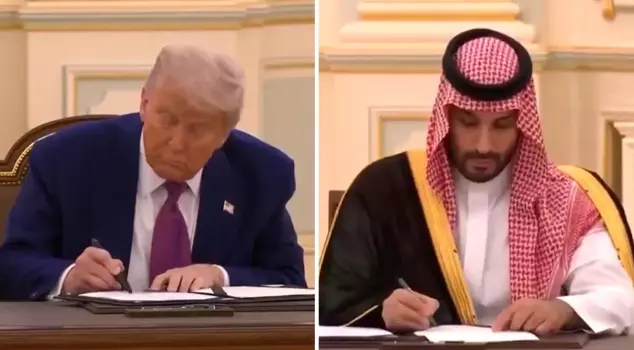 The moment Trump signed the historic arms deal with Saudi Arabia.