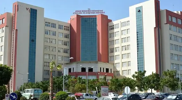 A state hospital professor and his secretary are in custody for bribery.