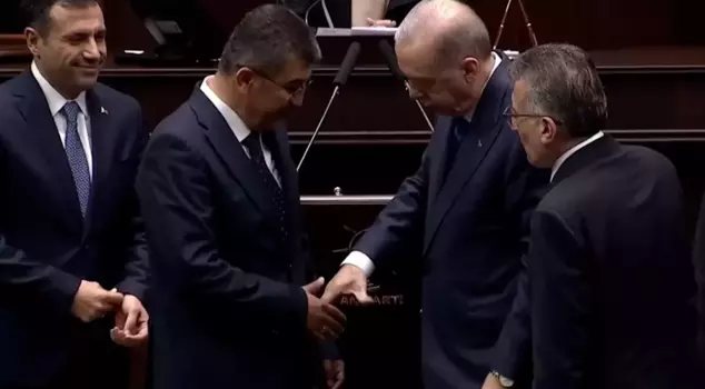 The badge-wearing ceremony was marked by Erdoğan's question: Which party did he come from, and where did he come from?