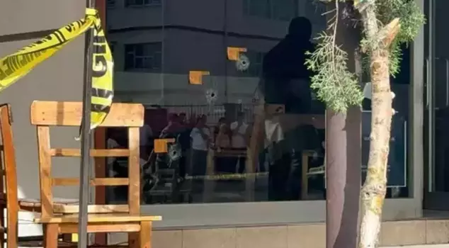 They opened fire on the young man sitting in front of the tea house.