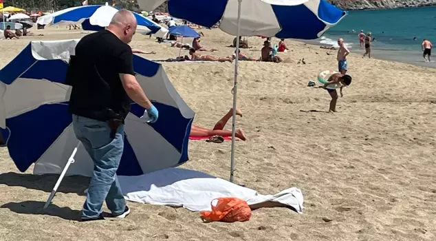 A German tourist sunbathing on the beach in Alanya has died.