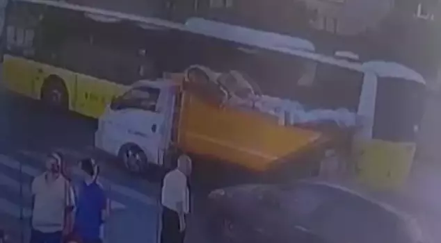 The garbage truck ran over the sanitation worker.