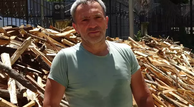 He earns 80 thousand lira a month by chopping wood.