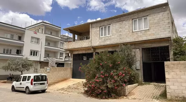 A 25-year-old woman was found dead at home, having been strangled.