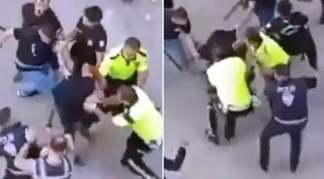 Street fight with stones and sticks: 3 people injured.