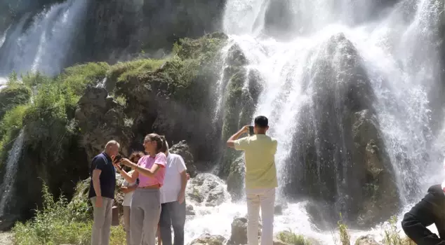 Girlevik Waterfall was flooded with local and foreign tourists during the holiday.